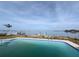 Backyard features a beautiful pool with waterfront views of a tranquil bay at 5434 Oakhurst Dr, Seminole, FL 33772