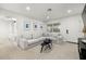 Bright living room featuring a comfortable sectional sofa and a stylish coffee table at 5809 Dartmouth N Ave, St Petersburg, FL 33710