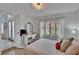 Bright bedroom features a desk and large windows with natural light at 706 Bunker View Dr, Apollo Beach, FL 33572