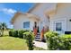 Charming home exterior with manicured landscaping and inviting entryway at 706 Bunker View Dr, Apollo Beach, FL 33572