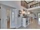 Upstairs hallway with a view of the living area at 706 Bunker View Dr, Apollo Beach, FL 33572