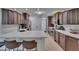 Modern kitchen features stainless steel appliances, sleek countertops, and ample cabinet space at 706 Bunker View Dr, Apollo Beach, FL 33572