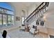 Bright living room with high ceilings and large windows for natural light at 706 Bunker View Dr, Apollo Beach, FL 33572