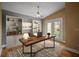 Home office featuring built-in bookshelves, an accent rug and a bright view to the outdoors at 706 Bunker View Dr, Apollo Beach, FL 33572