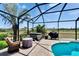 Inviting screened pool area with clear blue water and comfortable outdoor seating at 706 Bunker View Dr, Apollo Beach, FL 33572