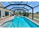 Inviting screened pool area with clear blue water and comfortable outdoor seating at 706 Bunker View Dr, Apollo Beach, FL 33572