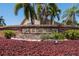 Welcoming Golf & Sea Village sign surrounded by beautiful landscaping at 706 Bunker View Dr, Apollo Beach, FL 33572