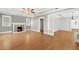Spacious living room boasts hardwood floors, a fireplace, and coffered ceilings at 103 S Habana Ave, Tampa, FL 33609