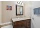 Bathroom showcases modern vanity, countertop, mirror and contemporary lighting at 13225 101St St # 107, Largo, FL 33773