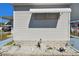 Exterior features decorative yard ornaments & tidy landscaping adding to its appeal at 13225 101St St # 107, Largo, FL 33773