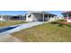Cozy single-story home with a covered carport, offering comfortable living at 13225 101St St # 107, Largo, FL 33773