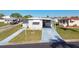Charming single-story home with a covered carport and well-maintained landscaping at 13225 101St St # 107, Largo, FL 33773
