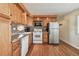 Traditional kitchen with bright cabinets, tile backsplash and stainless steel appliances at 13225 101St St # 107, Largo, FL 33773