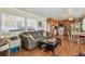 Comfortable living room space with hardwood floors, flows into the kitchen at 13225 101St St # 107, Largo, FL 33773