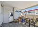 Exterior patio with seating, dolphin art, and protection from the elements at 13225 101St St # 107, Largo, FL 33773