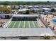 Aerial view showing shuffleboard courts next to community pool and residences at 13225 101St St # 107, Largo, FL 33773
