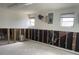 Spacious basement with exposed framework, awaiting customization and design opportunities at 14612 Coral Dr, Hudson, FL 34667