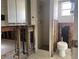 Bathroom interior featuring a tiled shower and visible plumbing, ready for renovation and customization at 14612 Coral Dr, Hudson, FL 34667