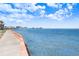 Scenic waterfront view with clear blue water and sky, perfect for seaside living or vacation getaway at 14612 Coral Dr, Hudson, FL 34667