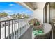 Charming balcony featuring comfortable seating with beautiful neighborhood views, perfect for enjoying outdoors at 15 Glendale St # B6, Clearwater Beach, FL 33767