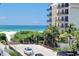 Beautiful ocean view of an exterior of building with balconies and beach access at 15 Glendale St # B6, Clearwater Beach, FL 33767