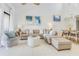 Living room featuring tile floors, stylish seating, decorative lighting, and serene decor at 15 Glendale St # B6, Clearwater Beach, FL 33767