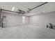 Spacious garage with ample room for parking and storage, also including a water heater at 15409 Coot Rd, Weeki Wachee, FL 34614