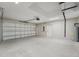 Spacious two-car garage with plenty of room for vehicles and storage at 15409 Coot Rd, Weeki Wachee, FL 34614