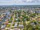 Scenic aerial shot of the neighborhood highlighting waterfront access, lush greenery, and convenient location near urban areas at 1666 N Dakota Ne Ave, St Petersburg, FL 33703