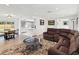Open-concept living space with seating, a dining area, and a view of the kitchen at 1666 N Dakota Ne Ave, St Petersburg, FL 33703