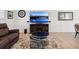 Stylish living room with modern furniture, light wood flooring, and a sleek entertainment center at 1666 N Dakota Ne Ave, St Petersburg, FL 33703