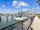 Picturesque marina view featuring sailboats, with a city skyline backdrop, creating a tranquil maritime atmosphere at 1666 N Dakota Ne Ave, St Petersburg, FL 33703