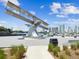 The Benoist Plaza waterfront area features a vintage airplane statue and stunning views of the marina and city skyline at 1666 N Dakota Ne Ave, St Petersburg, FL 33703