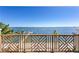 Balcony with stunning waterfront views, providing a serene retreat to relax and enjoy the coastal scenery at 1695 Brightwaters Ne Blvd, St Petersburg, FL 33704