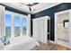 This bedroom features a large closet and water views at 1695 Brightwaters Ne Blvd, St Petersburg, FL 33704