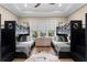 Charming bedroom with custom-built bunk beds, natural light, and hardwood floors at 1695 Brightwaters Ne Blvd, St Petersburg, FL 33704