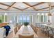 Spacious living room, seamlessly connecting to a dining area and kitchen with views of the water at 1695 Brightwaters Ne Blvd, St Petersburg, FL 33704