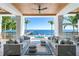 Inviting outdoor patio featuring comfortable seating, water views, and a serene waterfront setting at 1695 Brightwaters Ne Blvd, St Petersburg, FL 33704