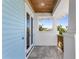 Outdoor shower located on a porch area, with views of blue skies and tropical plants at 1695 Brightwaters Ne Blvd, St Petersburg, FL 33704