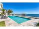 Luxury waterfront pool with stunning views of the ocean and private dock at 1695 Brightwaters Ne Blvd, St Petersburg, FL 33704