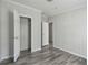 This bedroom includes wood-look floors and closet space at 17913 Greensboro St, Spring Hill, FL 34610