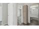 Hallway view showcasing linen closet, connecting to the bathroom and another room at 17913 Greensboro St, Spring Hill, FL 34610