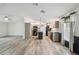 Large open kitchen with island, recessed lighting and black appliances at 17913 Greensboro St, Spring Hill, FL 34610