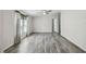 Bright living room with hard surface floors and a ceiling fan at 17913 Greensboro St, Spring Hill, FL 34610
