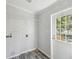 Utility room features a white door with multi-pane window and hookups at 17913 Greensboro St, Spring Hill, FL 34610