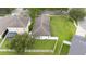 Aerial view of the property showcasing lush backyard, providing ample space for Gathering enjoyment at 18150 Leamington Ln, Land O Lakes, FL 34638