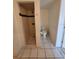 Bathroom featuring tiled stand-up shower and toilet at 204 Shore W Dr, Oldsmar, FL 34677