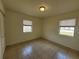 Bright bedroom with tile flooring, neutral paint and natural light at 204 Shore W Dr, Oldsmar, FL 34677