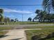 Waterfront park with a playground and pavilion at 204 Shore W Dr, Oldsmar, FL 34677