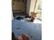 Dirty room with stained floor, boxes, and general disrepair at 204 Shore W Dr, Oldsmar, FL 34677